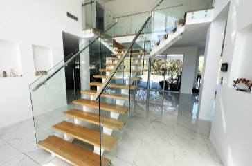 What are the benefits of frameless glass balustrades?
